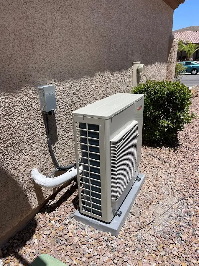 Residential air conditioning condenser unit in Marilla